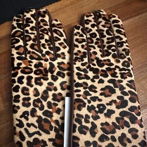 Woman’s leopard calf hair, leather glove. Wool and cashmere lined never worn